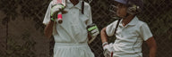 Young batters padded up with gloves