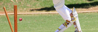 Young batter in cricket spikes