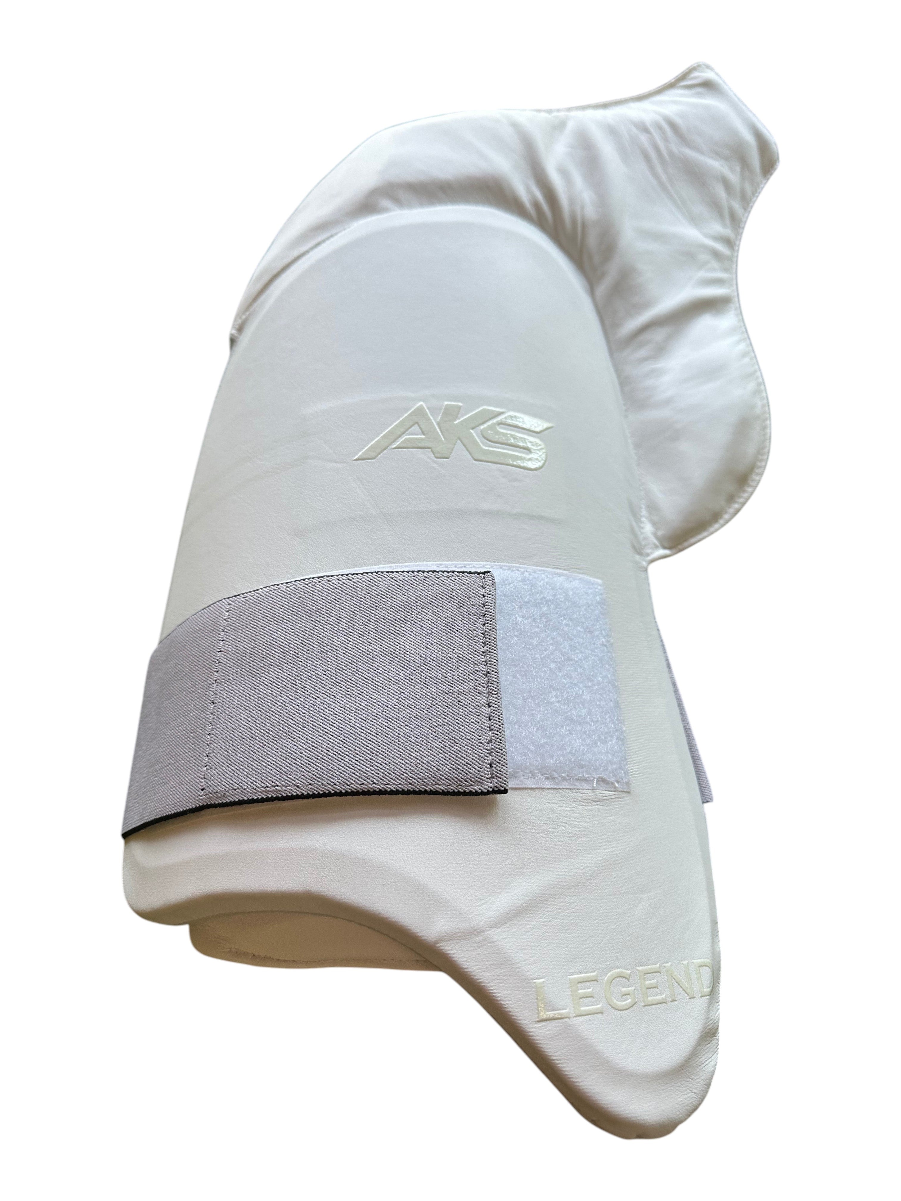 AKS CRICKET Legend thigh pad in white with adjustable grey strap and protective padding for cricket players