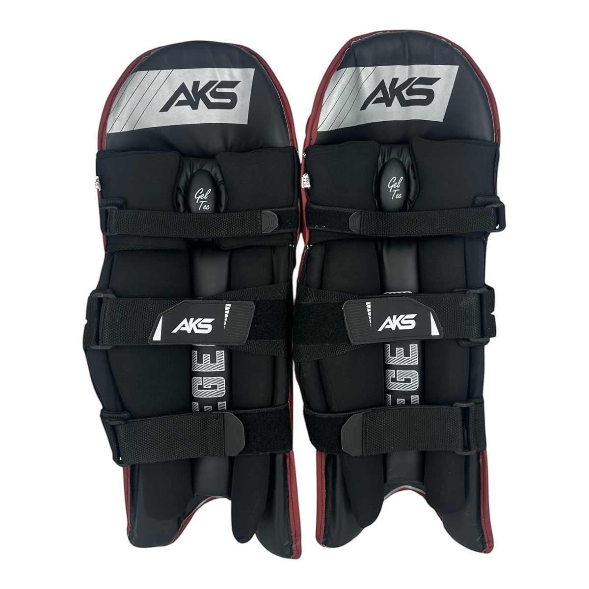 AKS CRICKET Legend batting pads in maroon and black with moulded knee rolls and three-bolster face design.