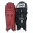 AKS CRICKET Legend maroon batting pads featuring a three-bolster face, moulded knee roll, and black adjustable straps.