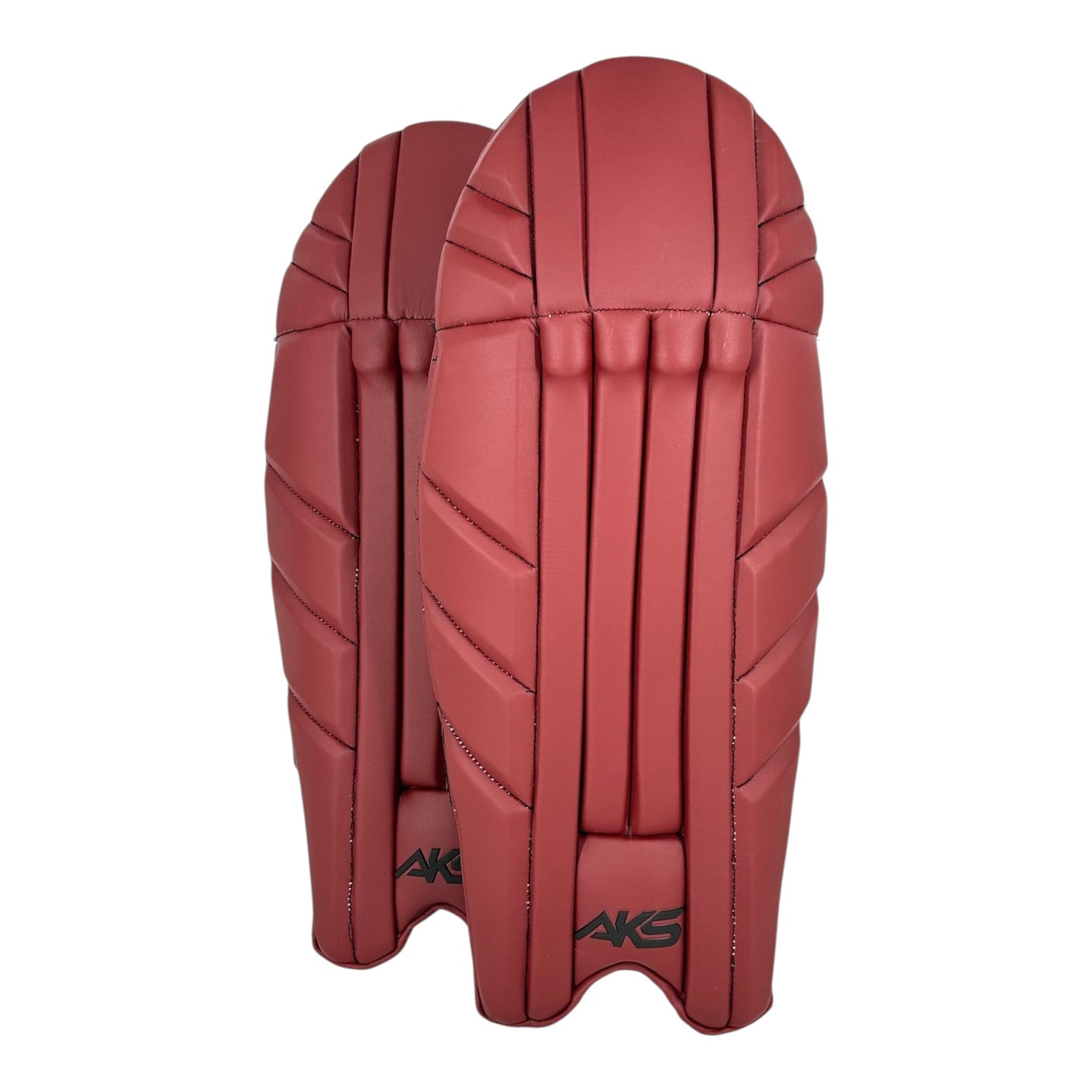 AKS CRICKET maroon wicket keeping pads with moulded knee rolls and bolstered insteps for lightweight mobility.