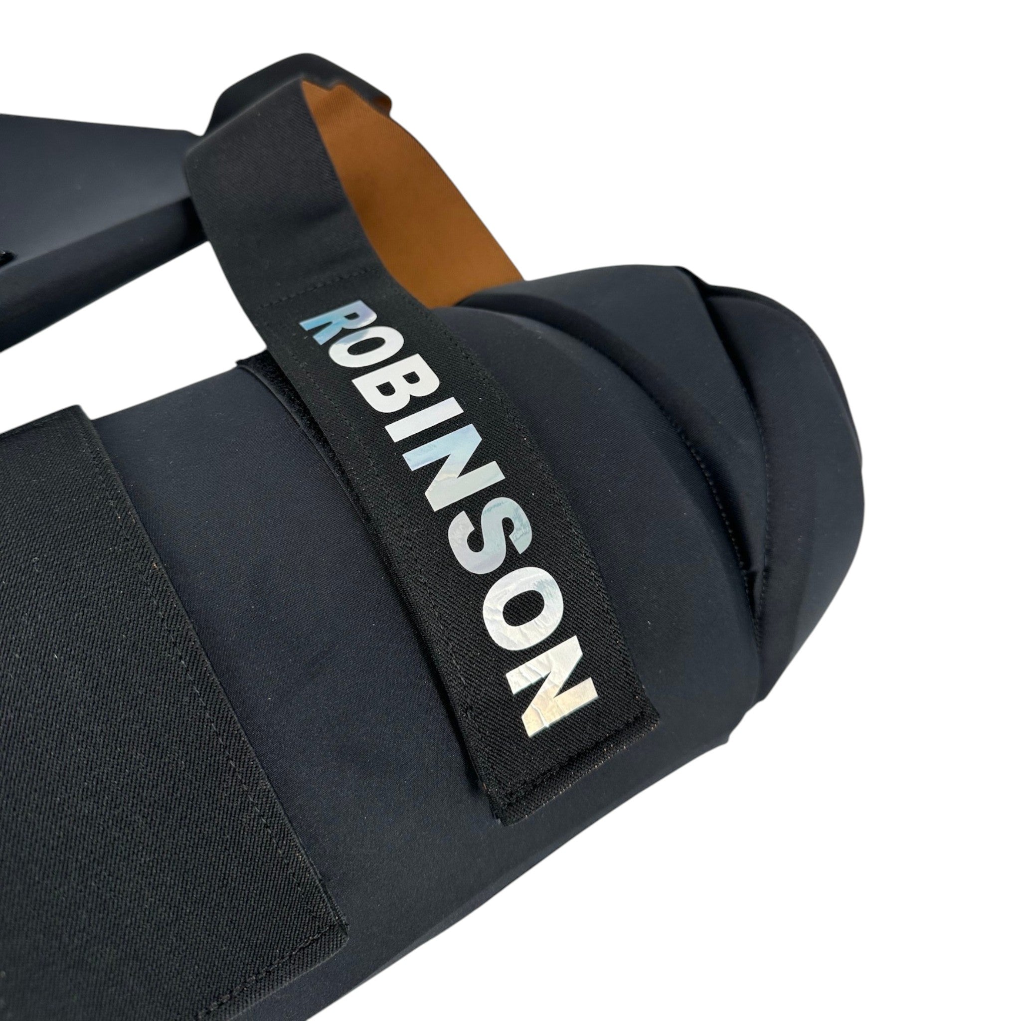 AKS CRICKET professional black thigh guard with holographic branding and adjustable elastic straps for cricket players