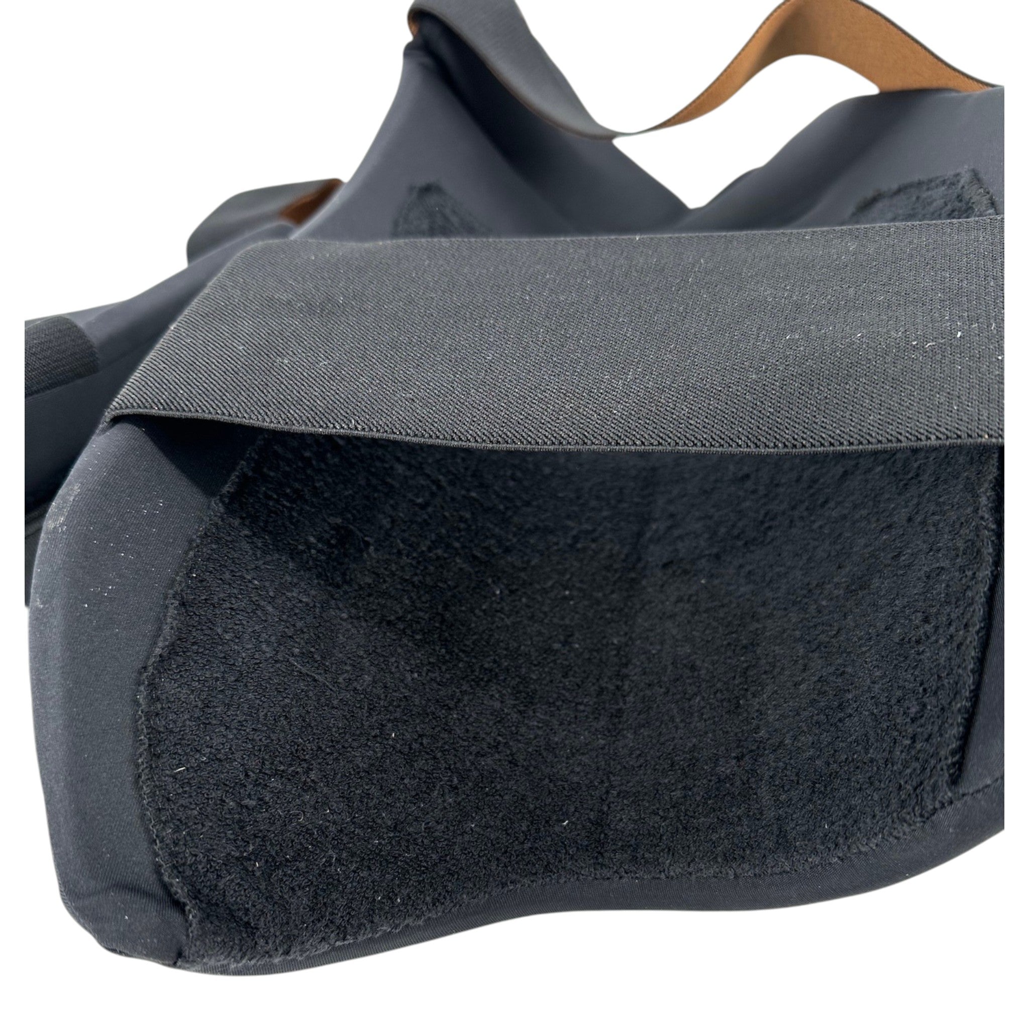 AKS CRICKET professional black thigh guard set with moisture-wicking interior lining and adjustable elastic straps.