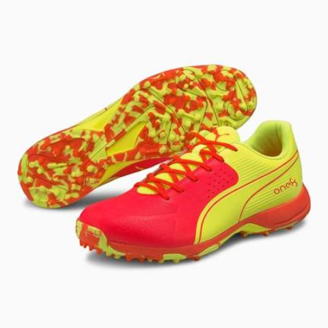 AKS CRICKET Puma 19 FH rubber cricket shoes in bright orange and yellow with a durable mesh and TPU upper