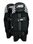 AKS CRICKET red and black wicket keeping pads with white chevron pattern, moulded knee roll, and adjustable straps.