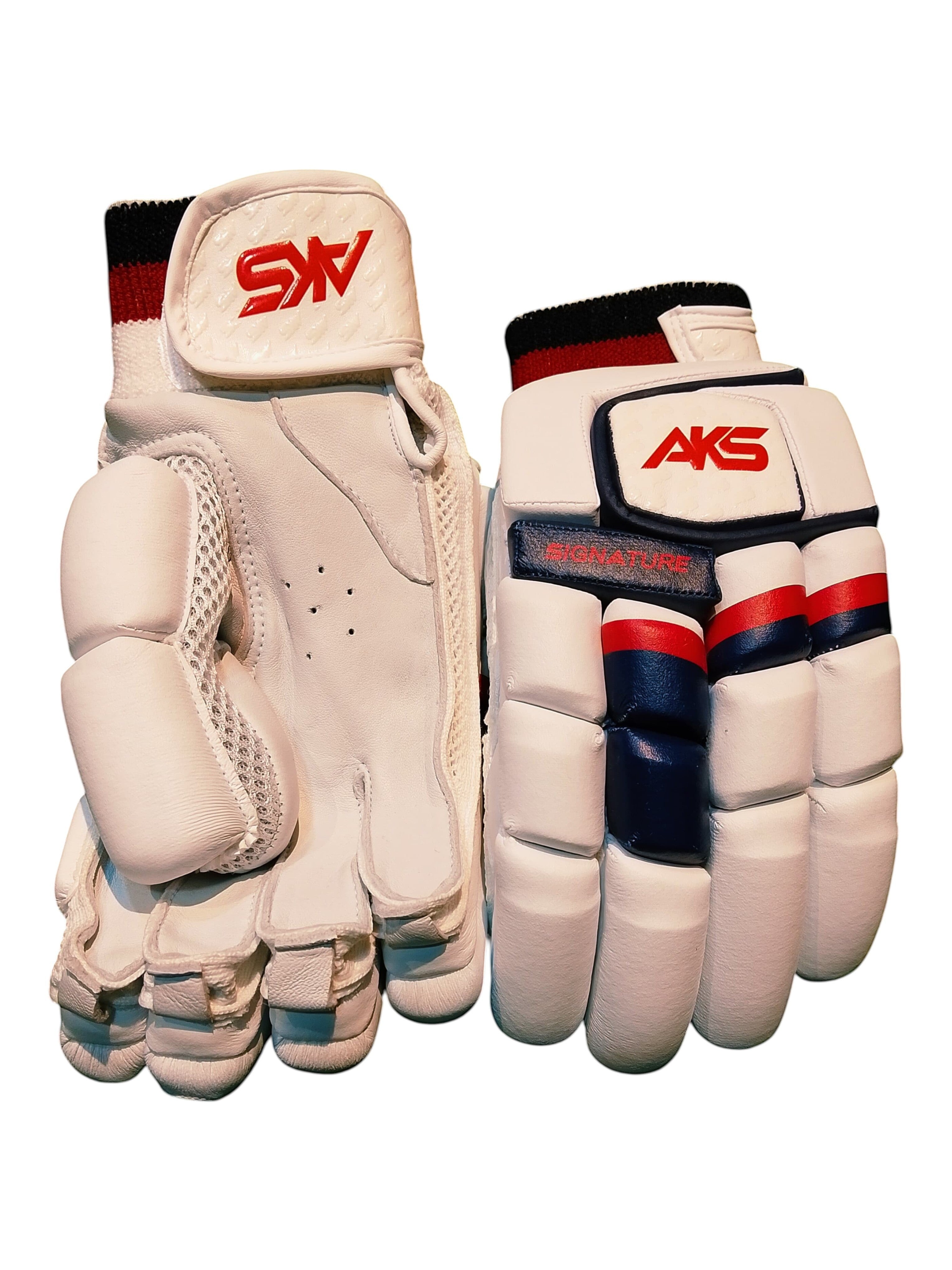 AKS CRICKET Signature batting gloves in white with navy and red accents, featuring premium leather and foam protection.