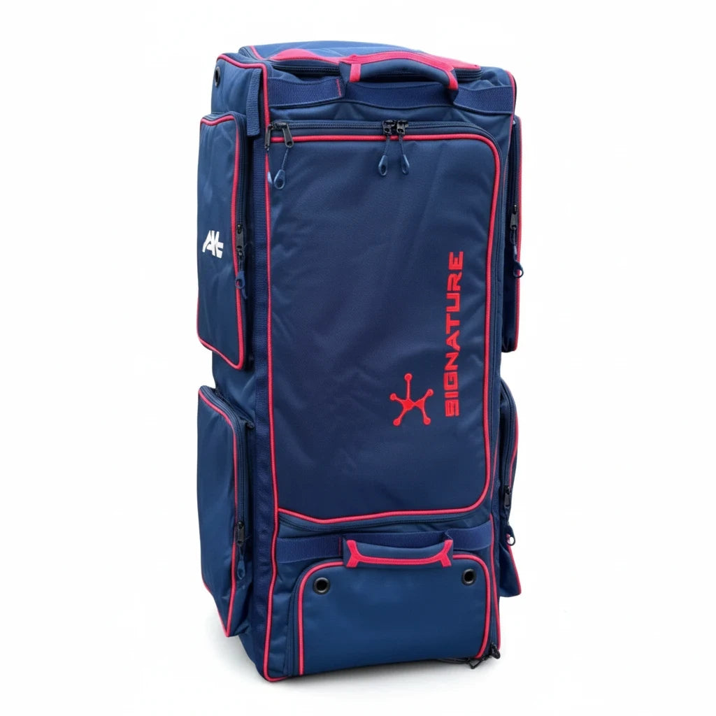 AKS CRICKET Signature duffle bag in navy blue with red accents, featuring multiple compartments and durable design.