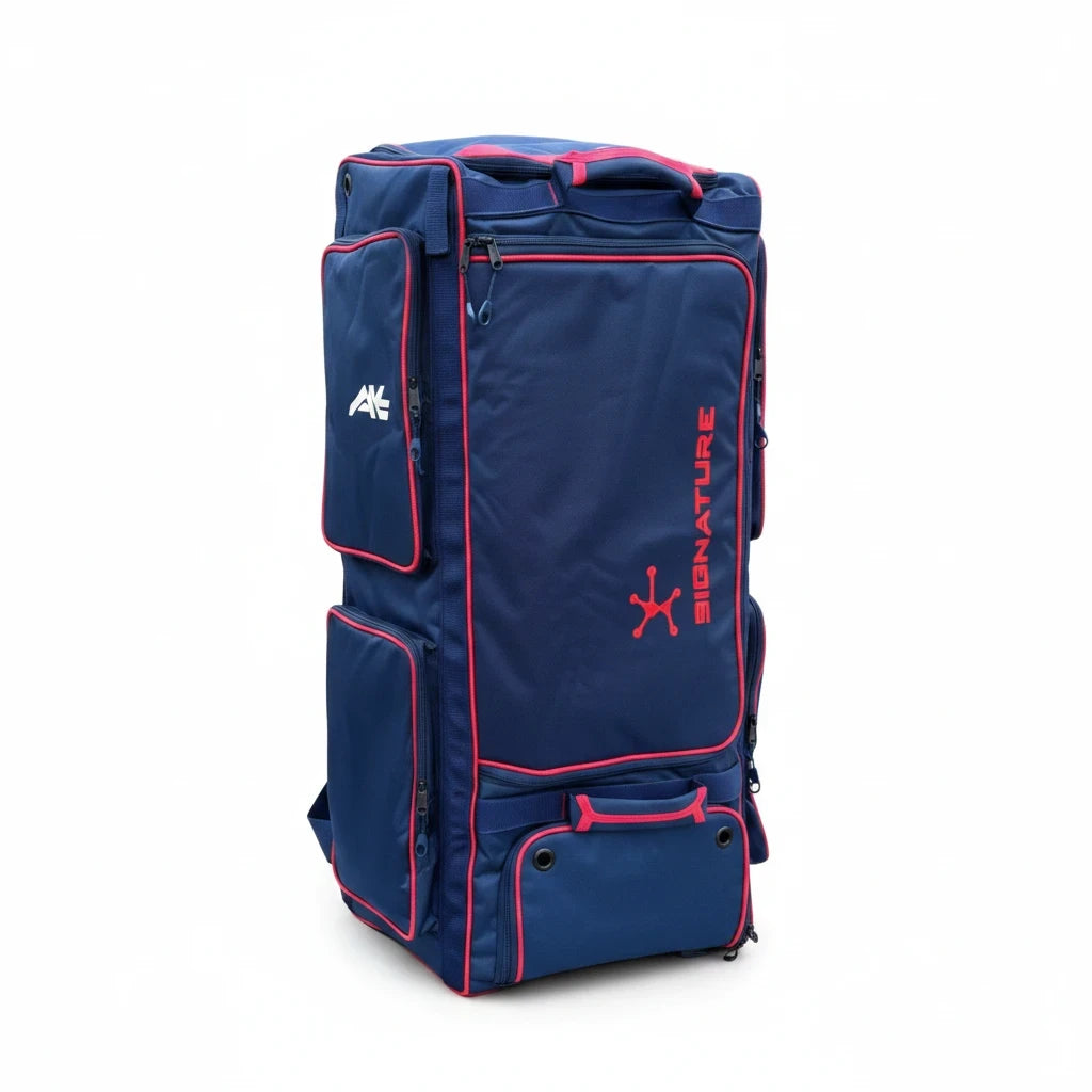 AKS CRICKET Signature Duffle Bag in navy blue and red with multiple compartments and durable weather-resistant fabric.