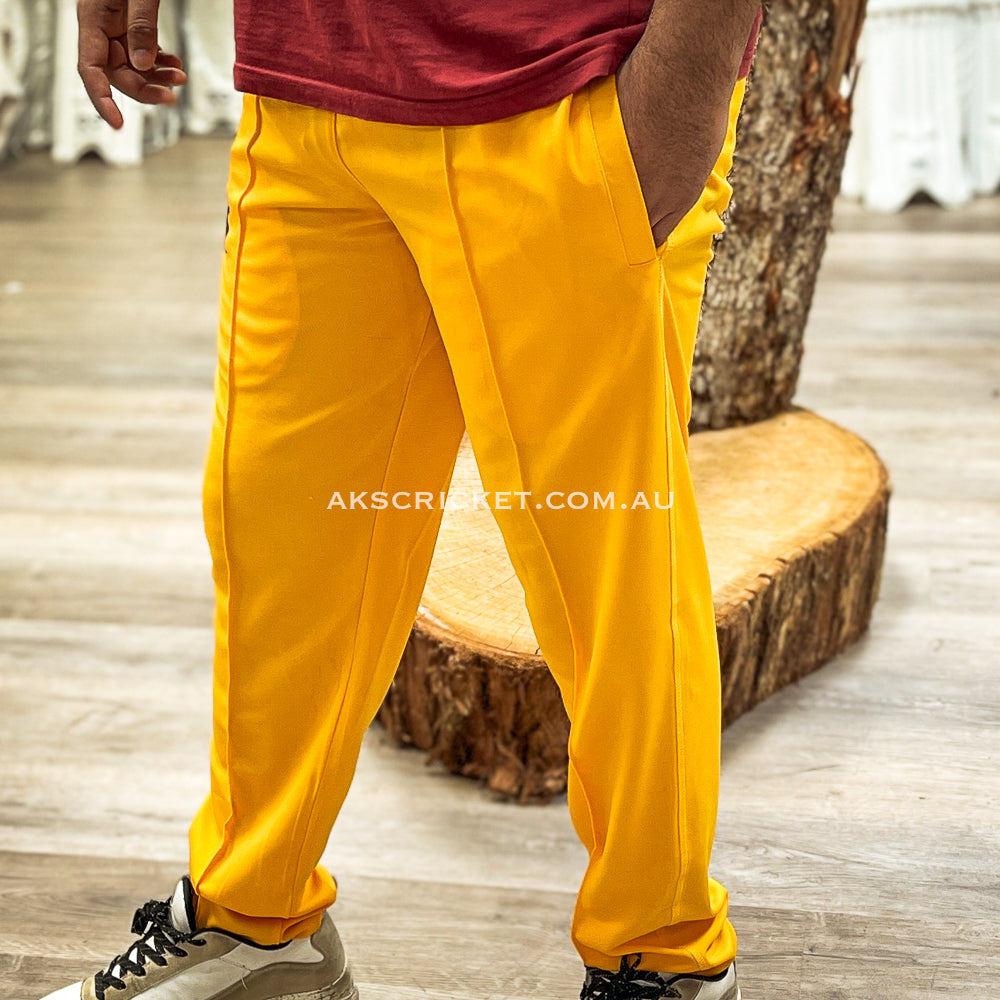 AKS CRICKET TROUSERS GOLD YELLOW