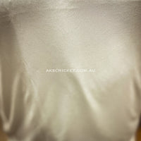 AKS off white cricket trousers front